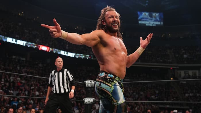 Kenny Omega poses in the ring at AEW All Out