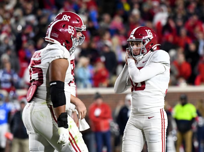 Nov 12, 2022; Oxford, Mississippi, USA; Alabama Crimson Tide place kicker Will Reichard (16) reacts after kicking a 49 yard field goal against the Ole Miss Rebels at Vaught-Hemingway Stadium. Alabama won 30-24. Mandatory Credit: Gary Cosby Jr.-USA TODAY Sports