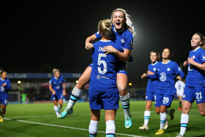 Scorers Sophie Ingle (#5) and Erin Cuthbert pictured embracing during Chelsea's 2-0 win over Real Madrid in the Women's Champions League in November 2022