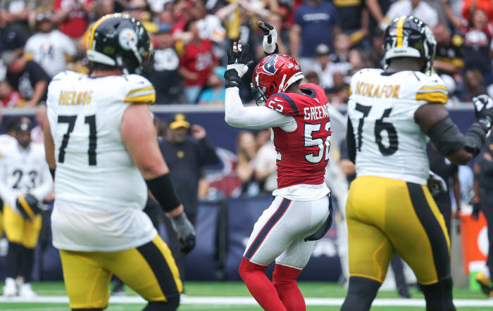 Oct 1, 2023; Houston, Texas, USA; Houston Texans defensive end Jonathan Greenard (52) reacts after making a tackle during the third quarter against the Pittsburgh Steelers at NRG Stadium. Mandatory Credit: Troy Taormina-USA TODAY Sports