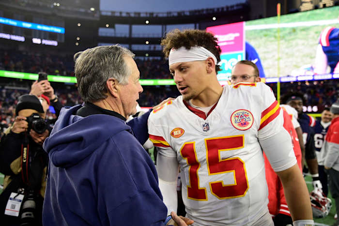 New England Patriots head coach Bill Belichick shakes hands with Kansas City Chiefs quarterback Patrick Mahomes after Sunday’s game at Gillette Stadium.