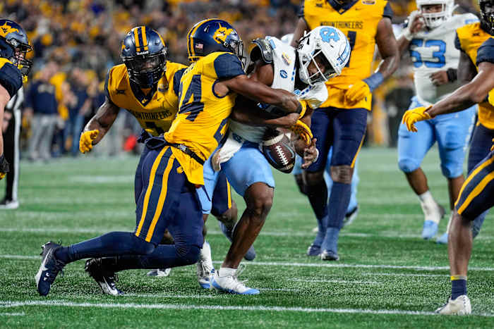UNC Football Star Reaches Milestone in Charlotte Despite Defeat