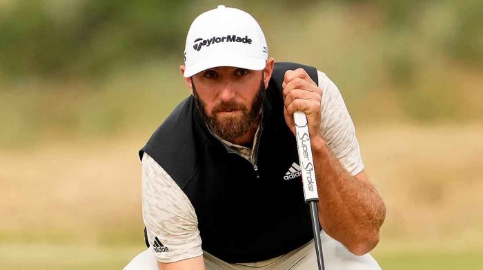 Dustin Johnson lines up a putt on Friday at the 2022 British Open.