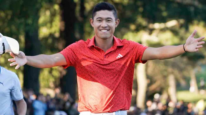 Collin Morikawa gestures to his wife Katherine Zhu, not pictured, after winning the PGA Tour Zozo Championship at the Narashino Country Club in Inzai on the outskirts of Tokyo, Sunday, Oct. 22, 2023.