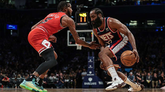 December 4, 2021;  Brooklyn, New York, United States;  Brooklyn Nets guard James Harden (13) dribbles while Chicago Bulls forward Derrick Jones Jr. (5) defends during the second half at Barclays Center.