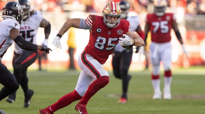 December 19, 2021;  Santa Clara, California, United States;  San Francisco 49ers tight end George Kittle (85) runs with the ball during the third quarter against the Atlanta Falcons at Levi's Stadium.