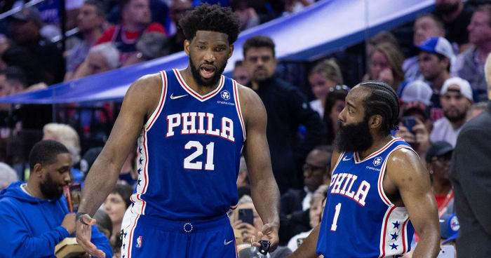 May 12, 2022;  Philadelphia, Pennsylvania, USA;  Philadelphia 76ers center Joel Embiid (21) and guard James Harden (1) speak during the fourth quarter against the Miami Heat in game six of the second round of the 2022 NBA Playoffs at the Wells Fargo Center.