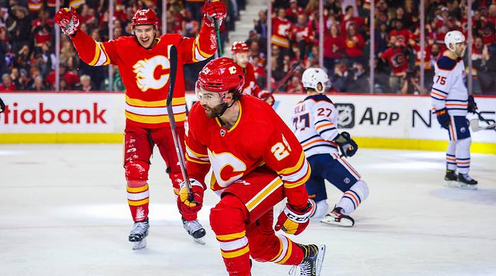 March 26, 2022; Calgary, Alberta, CAN; Calgary Flames center Dillon Dube (29) celebrates his goal against the Edmonton Oilers during the third period at the Scotiabank Saddledome.