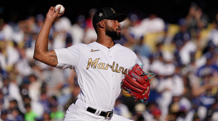 National League pitcher Sandy Alcantara, of the Miami Marlins, throws a field into the Major League during the second half of an MLB All-Star baseball game, Tuesday, July 19, 2022, in Los Angeles.