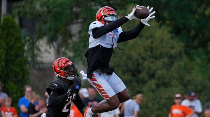 Cincinnati Bengals wide receiver Ja'Marr Chase (1) makes a leaping catch during training camp practice at the Paycor Stadium practice facility in downtown Cincinnati on Wednesday, Aug.  10, 2022. Bengals Training Camp