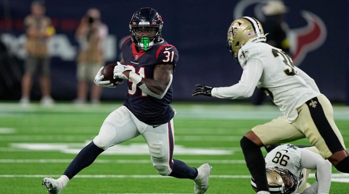 Houston Texans run back Damon Pierce (31) against New Orleans Saints during the first half of an NFL pre-season football game on Saturday, August 13, 2022, in Houston.