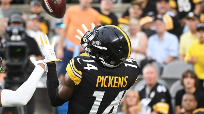 August 13, 2022;  Pittsburgh, Pennsylvania, USA;  Pittsburgh Steelers wide receiver George Pickens (14) catches a pass to land against the Seattle Seahawks during the first quarter at Acresor Stadium.