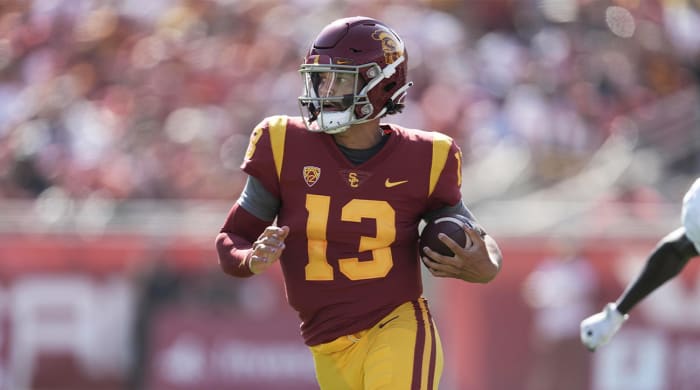 3 September 2022;  Los Angeles, California, USA;  Southern California Troy quarterback Caleb Williams (13) holds the ball against the Rice Poms in the first half at United Airlines Field at Los Angeles Memorial Coliseum.