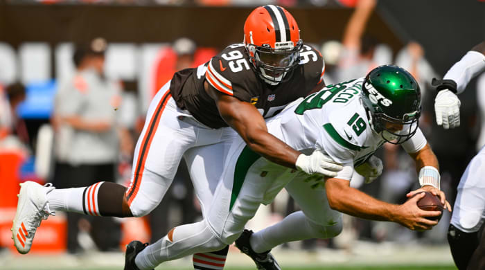 Cleveland Browns defensive end Miles Garrett (95) sacks New York Jets quarterback Joe Flacco (19) during the first half of an NFL football game, Sunday, September 18, 2022, in Cleveland.