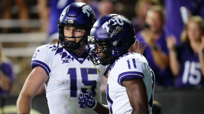 2 September 2022;  Boulder, Colorado, USA;  TCU Horned Frogs wide receiver Derius Davis (11) celebrated his home run with quarterback Max Duggan (15) in the fourth quarter against the Colorado Buffaloes at Folsom Field.