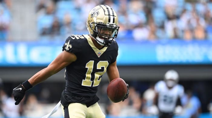 September 25, 2022;  Charlotte, North Carolina, USA  New Orleans Saints wide receiver Chris Olave (12) reacts after catching the ball in the second quarter at Bank of America Stadium.