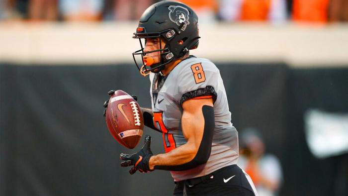 Oklahoma State wide receiver Braydon Johnson (8) runs for a touchdown in the first half of an NCAA college football game against Arkansas-Pine Bluff, Saturday, Sept. 17, 2022, in Stillwater, Okla.  (AP Photo/Brody Schmidt)