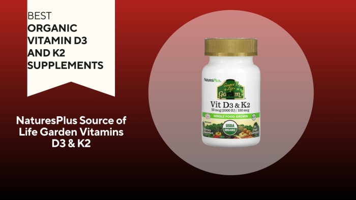 A bottle of NaturesPlus Source of Life Garden Vitamins D3 & K2 is pictured against a red background