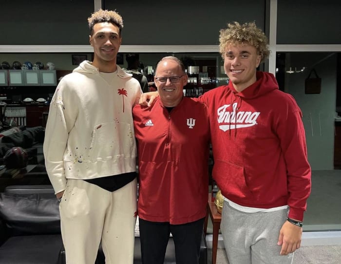 Trayce Jackson-Davis and his brother Tayven Jackson pose with Indiana football coach Tom Allen. (USA TODAY Sports)