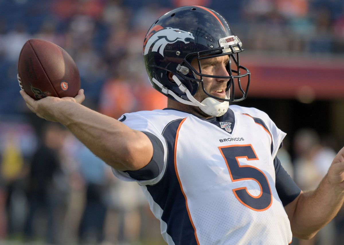 Denver Broncos quarterback Joe Flacco (5) throws the ball against the Atlanta Falcons during the Pro Football Hall of Fame Game at Tom Benson Hall of Fame Stadium.