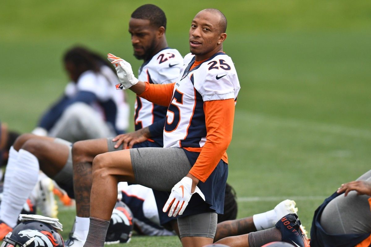 Denver Broncos cornerback Chris Harris (25) reacts during mini camp drills at the Pat Bowlen Fieldhouse at UCHealth Training Center.