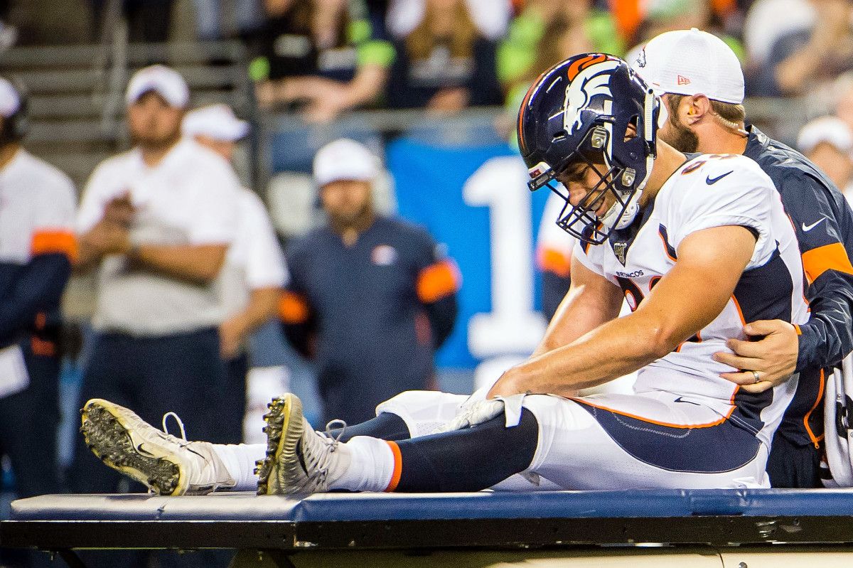 Denver Broncos tight end Austin Fort (89) is carted off the field after sustaining an injury in the second half against the Seattle Seahawks at CenturyLink Field. The Seahawks beat the Broncos 22-14.