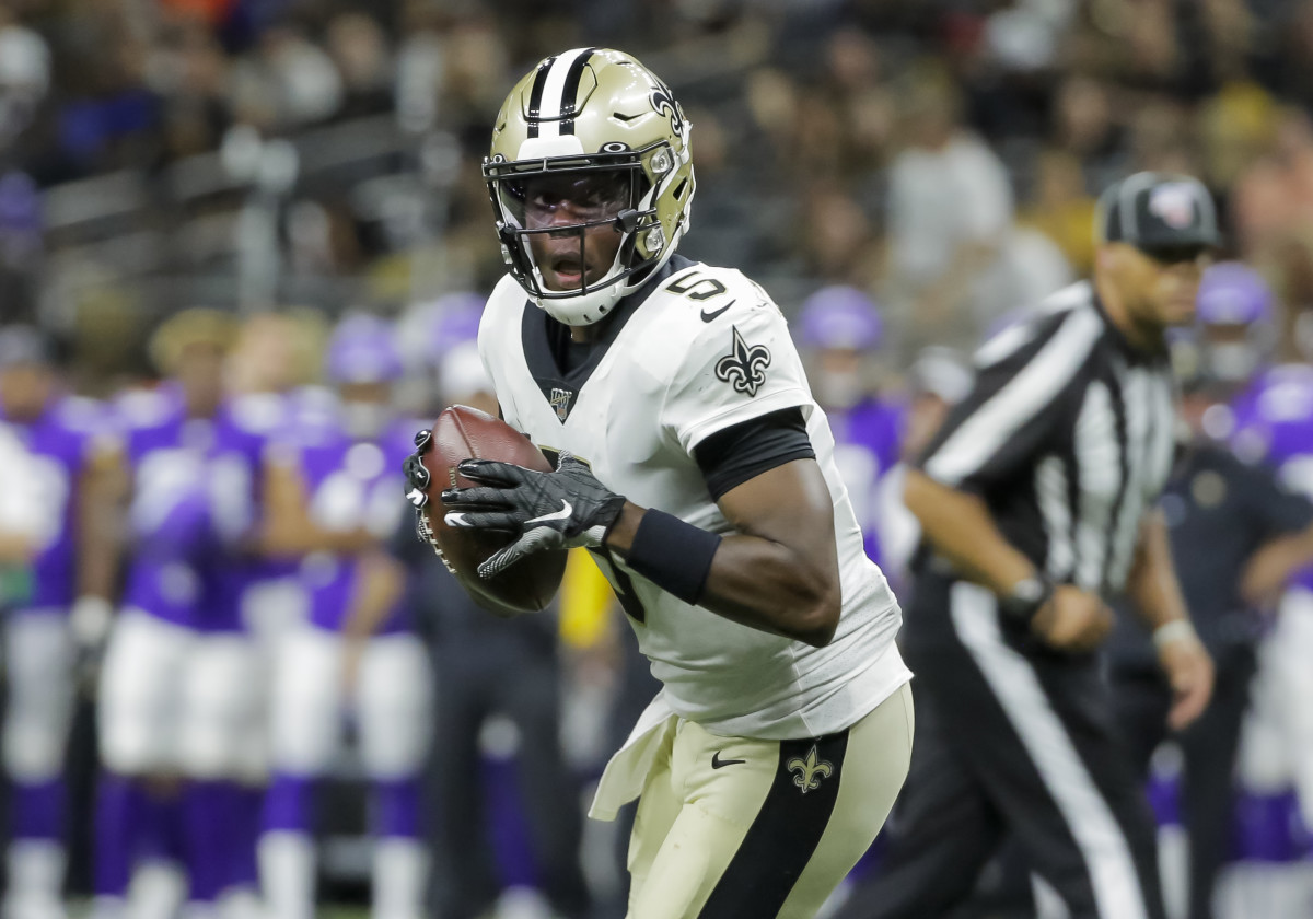 New Orleans Saints quarterback Teddy Bridgewater (5) looks to throw against the Minnesota Vikings during the second quarter at the Mercedes-Benz Superdome. Mandatory Credit: Derick E. Hingle-USA TODAY Sports