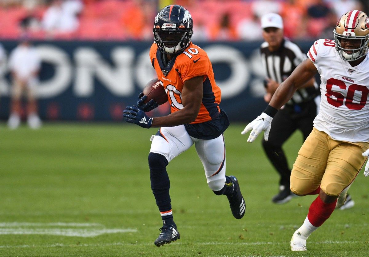 San Francisco 49ers defensive tackle Kevin Givens (60) chases down Denver Broncos wide receiver Emmanuel Sanders (10) in the first quarter at Broncos Stadium at Mile High.