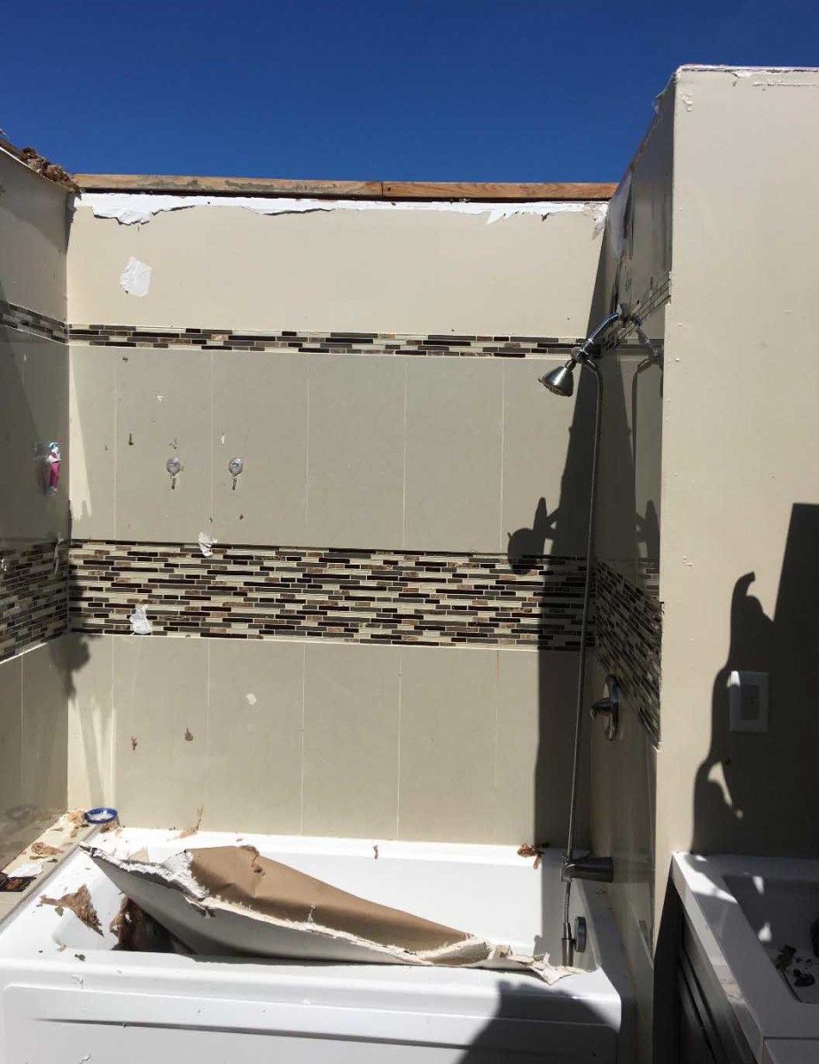 Tanya's master bathroom didn't even have a roof over it anymore after the storm.