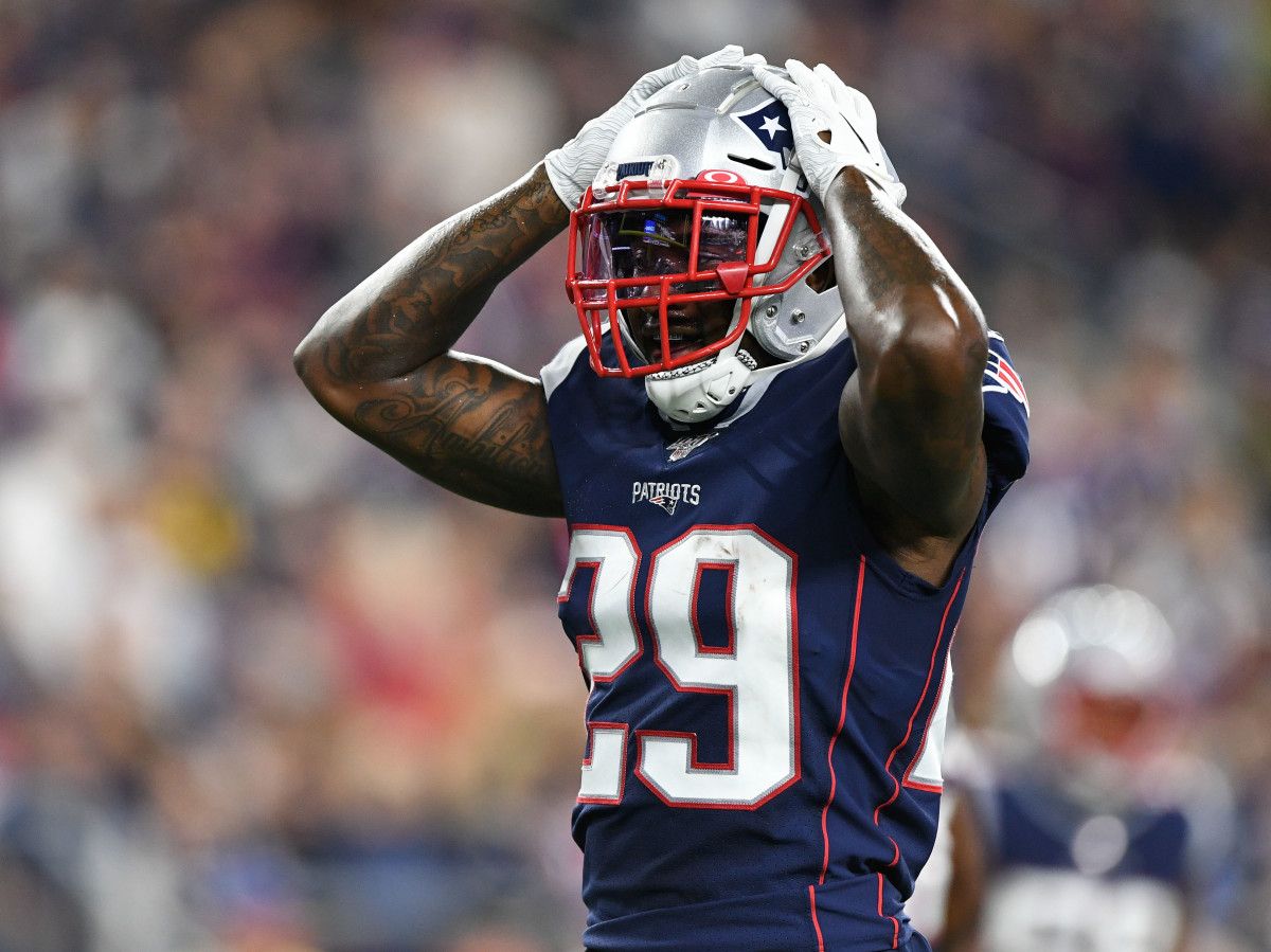 New England Patriots defensive back Duke Dawson (29) reacts after dropping a pass during the second half against the New York Giants at Gillette Stadium.