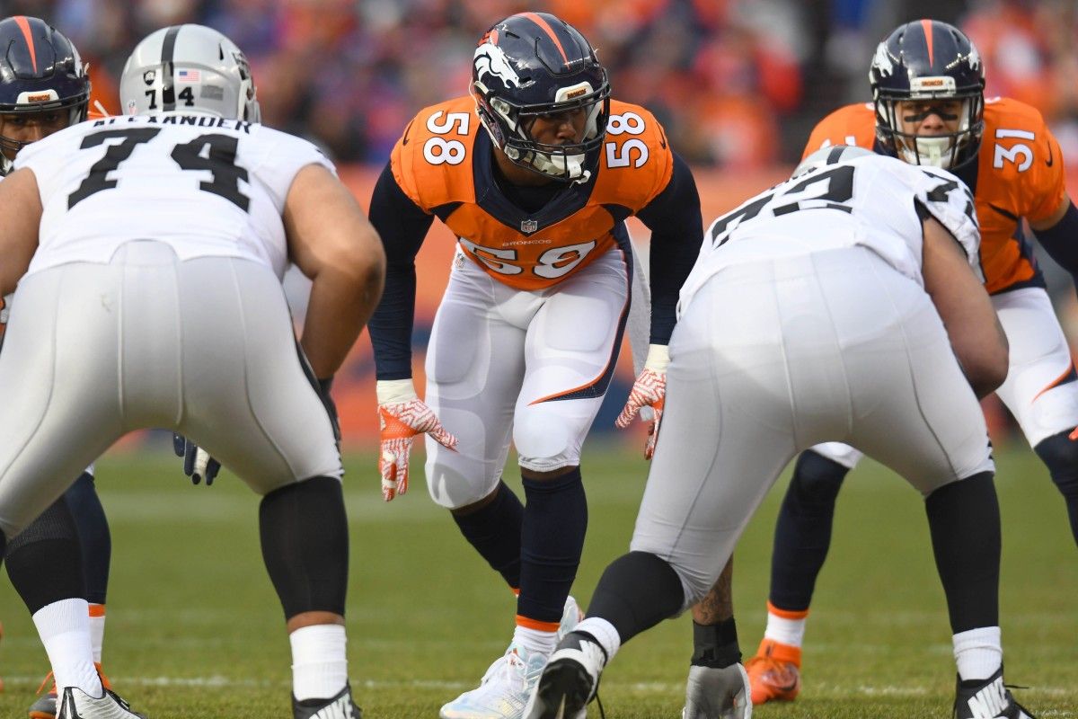 Denver Broncos outside linebacker Von Miller (58) lines up at the line of scrimmage during the first half of the game against the Oakland Raiders at Sports Authority Field.