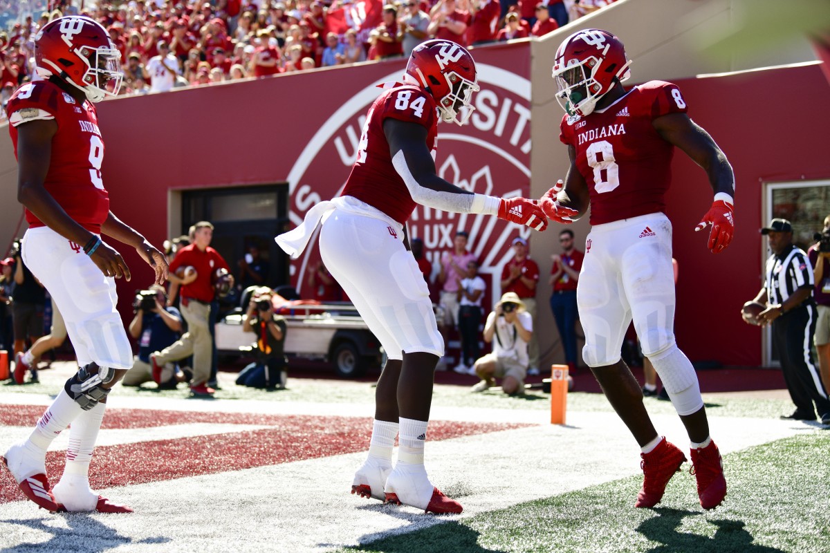 ;Indiana Hoosiers tight end Turon Ivy Jr. (84) celebrates a touchdown scored by Indiana Hoosiers running back Stevie Scott III (8) during the first quarter of the game against the Eastern Illinois Panthers at Memorial Stadium . Mandatory Credit: Marc Lebryk-USA TODAY Sports