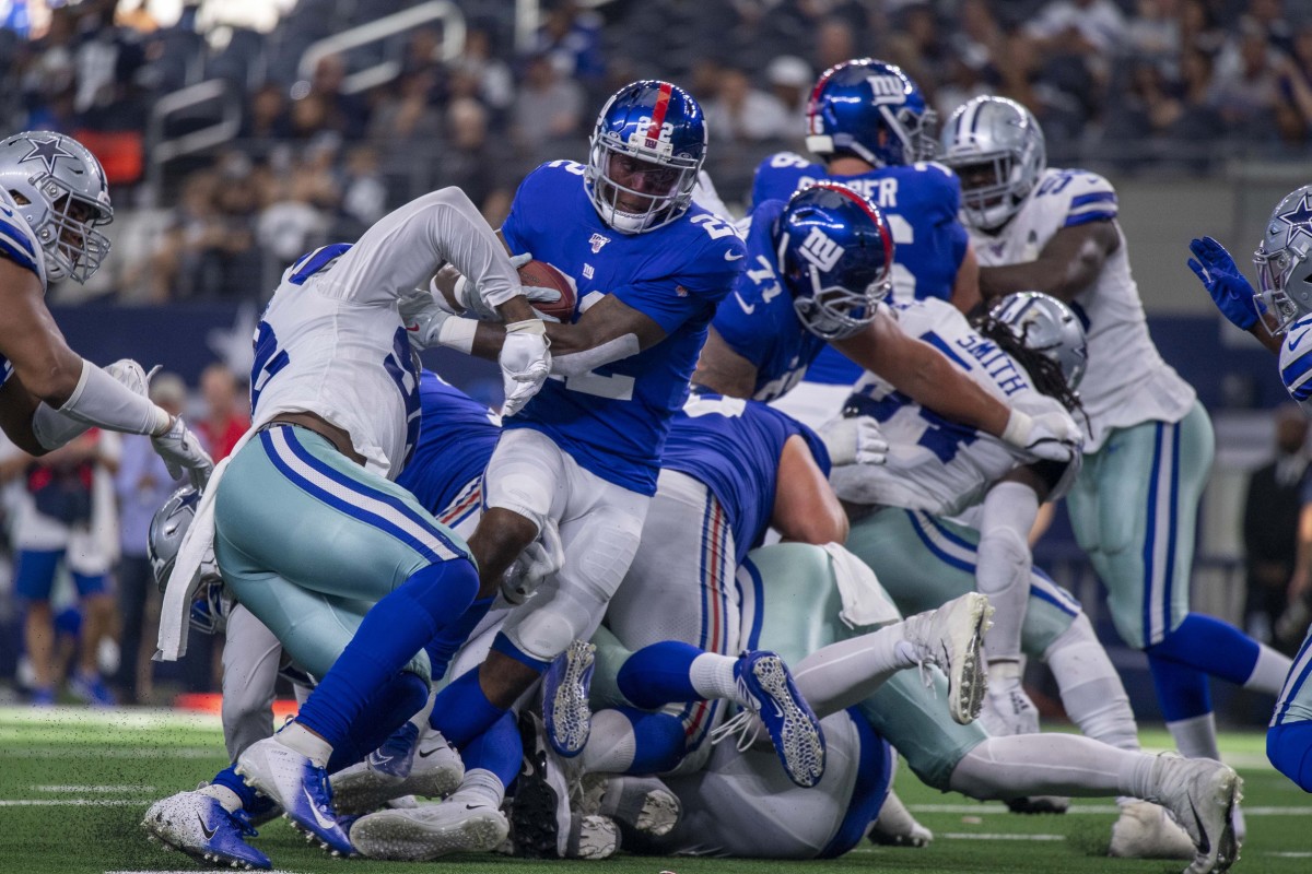 Sep 8, 2019; Arlington, TX, USA; New York Giants running back Wayne Gallman (22) scores a touchdown against the Dallas Cowboys during the second half at AT&T Stadium.