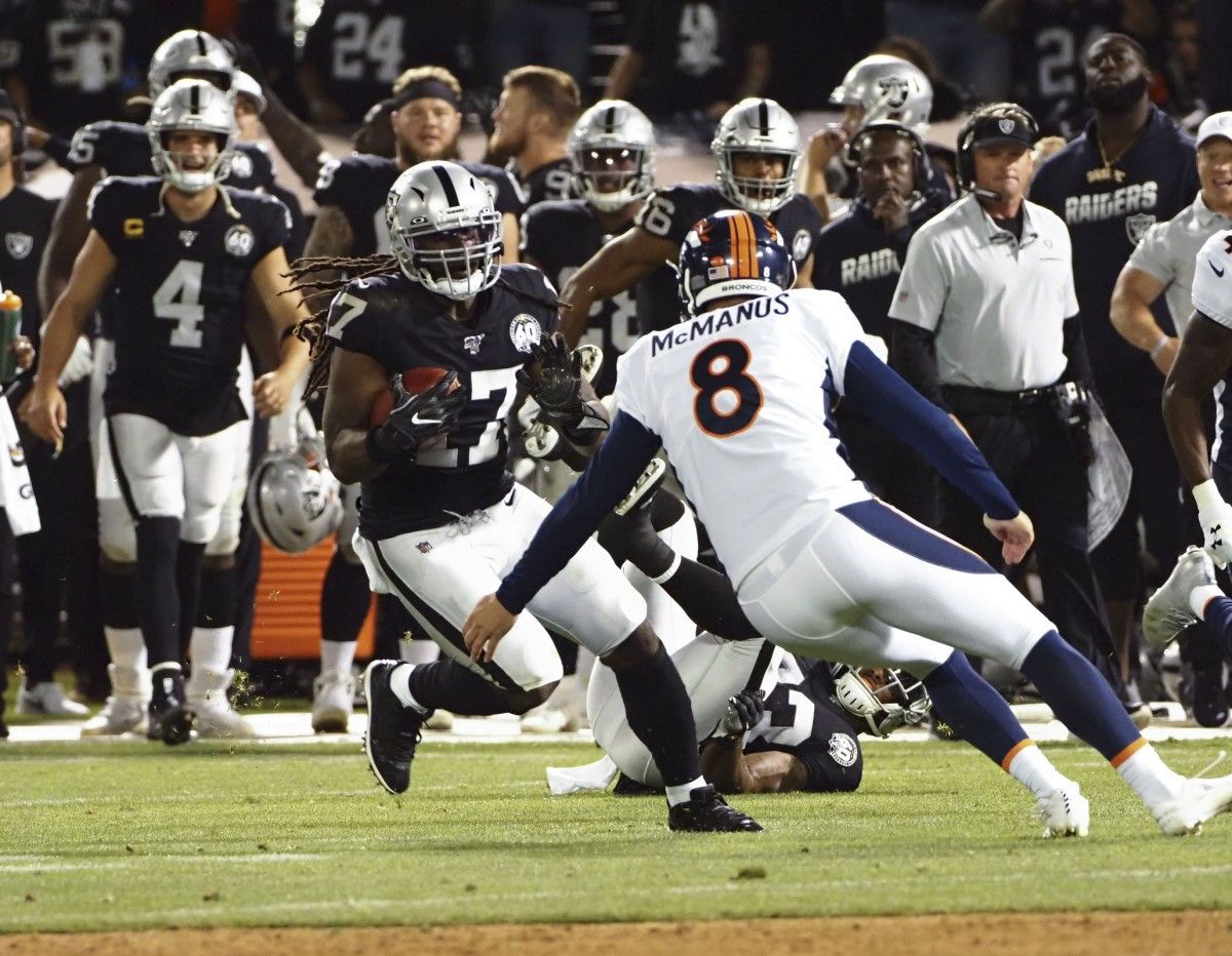 Oakland Raiders wide receiver Dwayne Harris (17) on a 72-yard kick return against the Denver Broncos during the fourth quarter at Oakland Coliseum.
