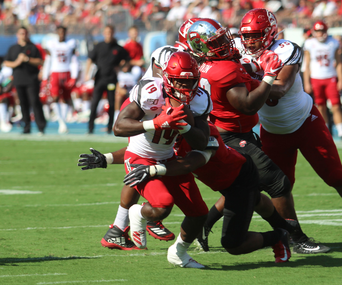 Hassan Hall carries the ball in the red zone against WKU. (Photo by Sam Draut)