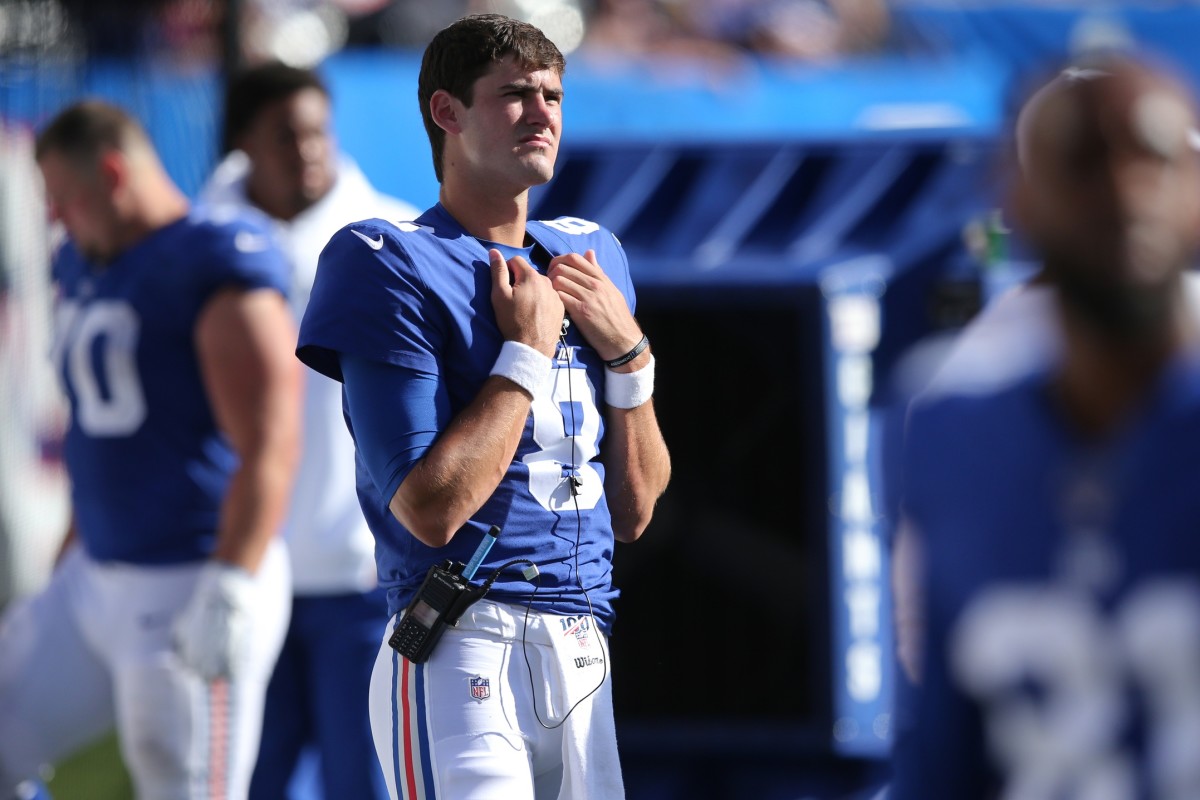 Sep 15, 2019; East Rutherford, NJ, USA; New York Giants quarterback Daniel Jones (8) watches from the sideline during the fourth quarter against the Buffalo Bills at MetLife Stadium.