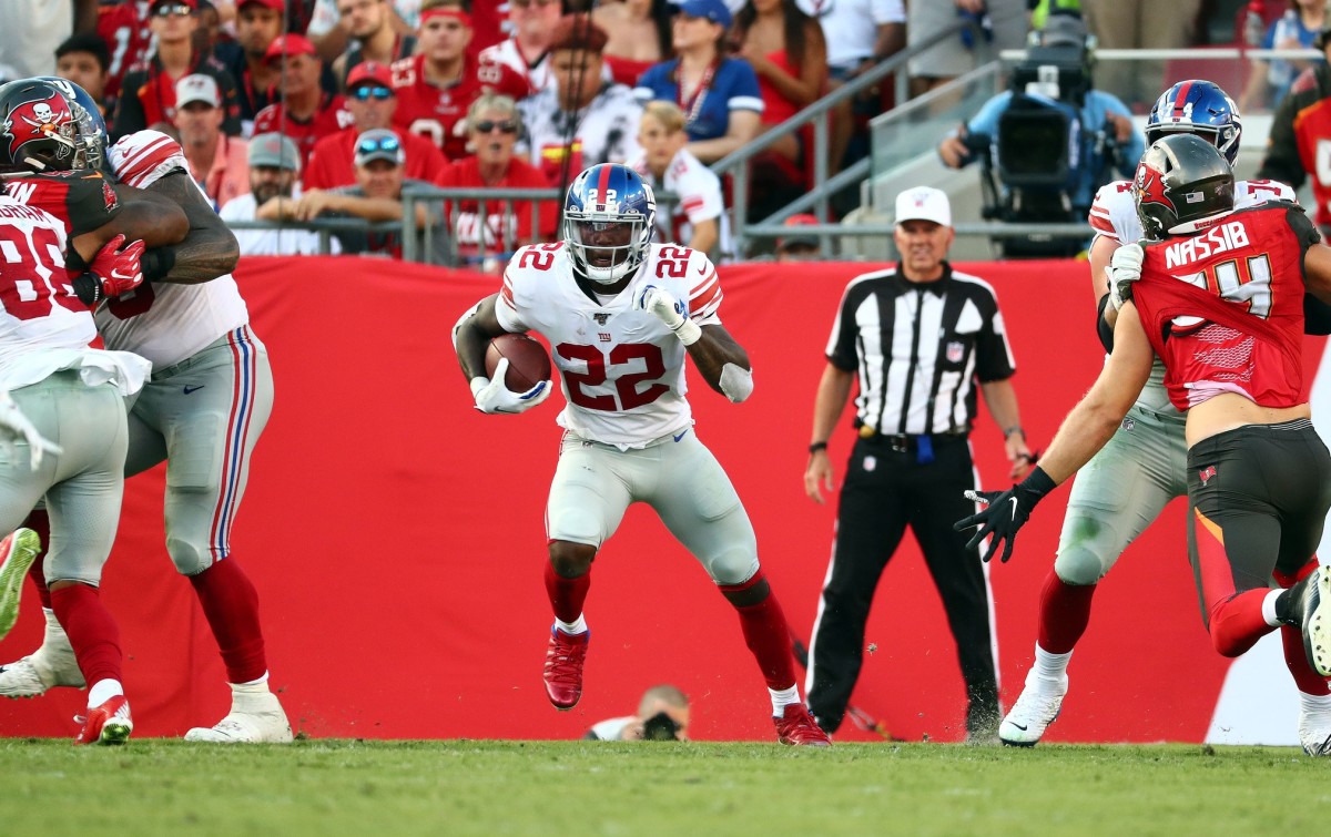 Sep 22, 2019; Tampa, FL, USA; New York Giants running back Wayne Gallman (22) runs with the ball against the Tampa Bay Buccaneers during the second half at Raymond James Stadium.