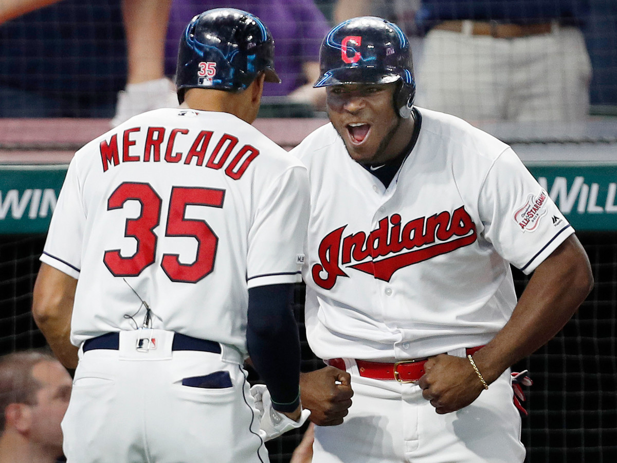 Oscar Mercado (left) and Yasiel Puig of the Cleveland Indians celebrate after Mercado hits a three-run home run against the Philadelphia Phillies at Progressive Field in Cleveland, Ohio, on Sept. 22, 2019. (Photo by David Maxwell/Getty Images)