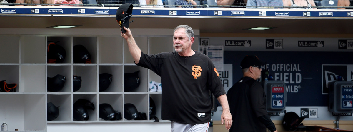 Bruce Bochy #15 of the San Francisco Giants tips his cap to the fans during the third inning of a baseball game against the San Diego Padres at Petco Park July 28, 2019 in San Diego, California. The game will be the last time he manages at Petco Park before his retirement