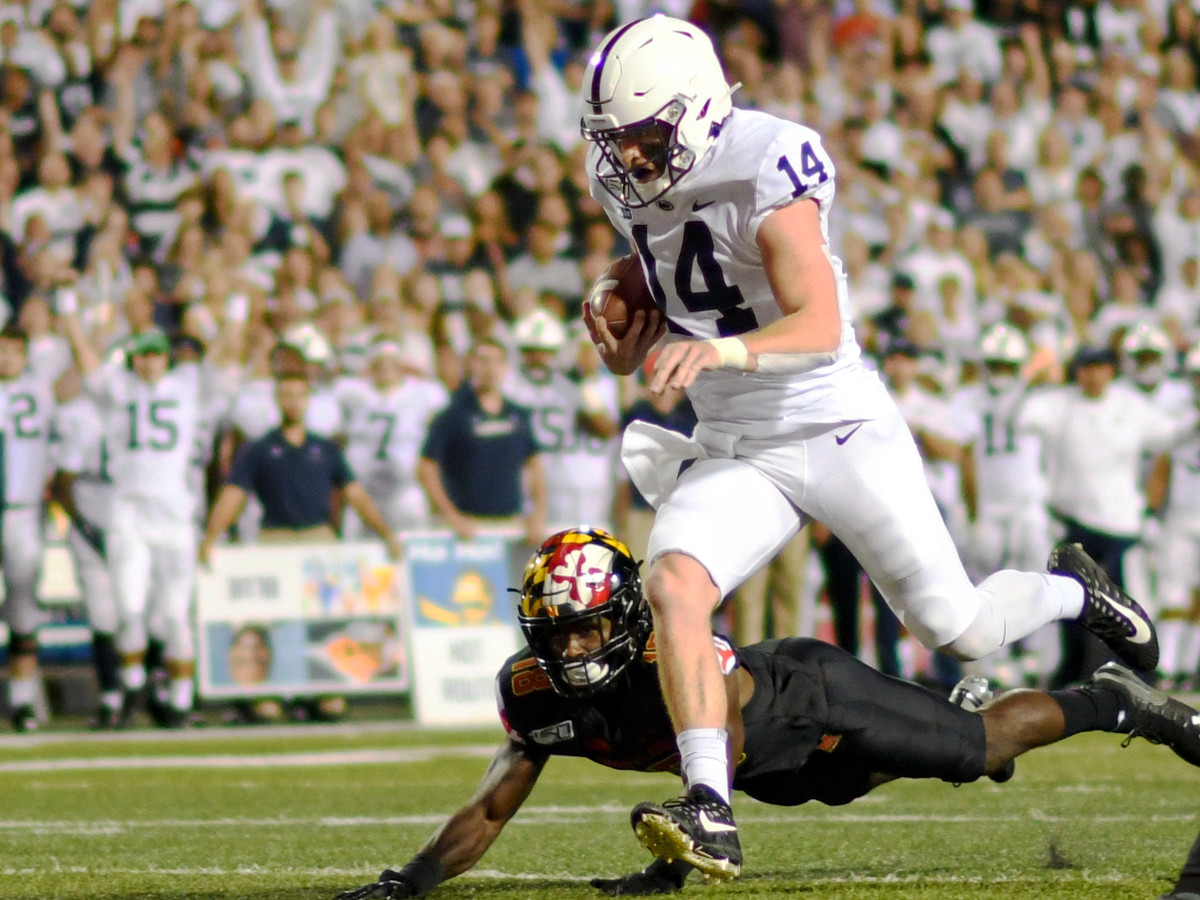 Penn State quarterback Sean Clifford (14) rushes for a touchdown in the first quarter of the Nittany Lions' 59-0 win over Maryland on Friday, Sept. 27, 2019, at Capital One Field at Maryland Stadium in College Park, Md. (Mark Goldman/Icon Sportswire via Getty Images)