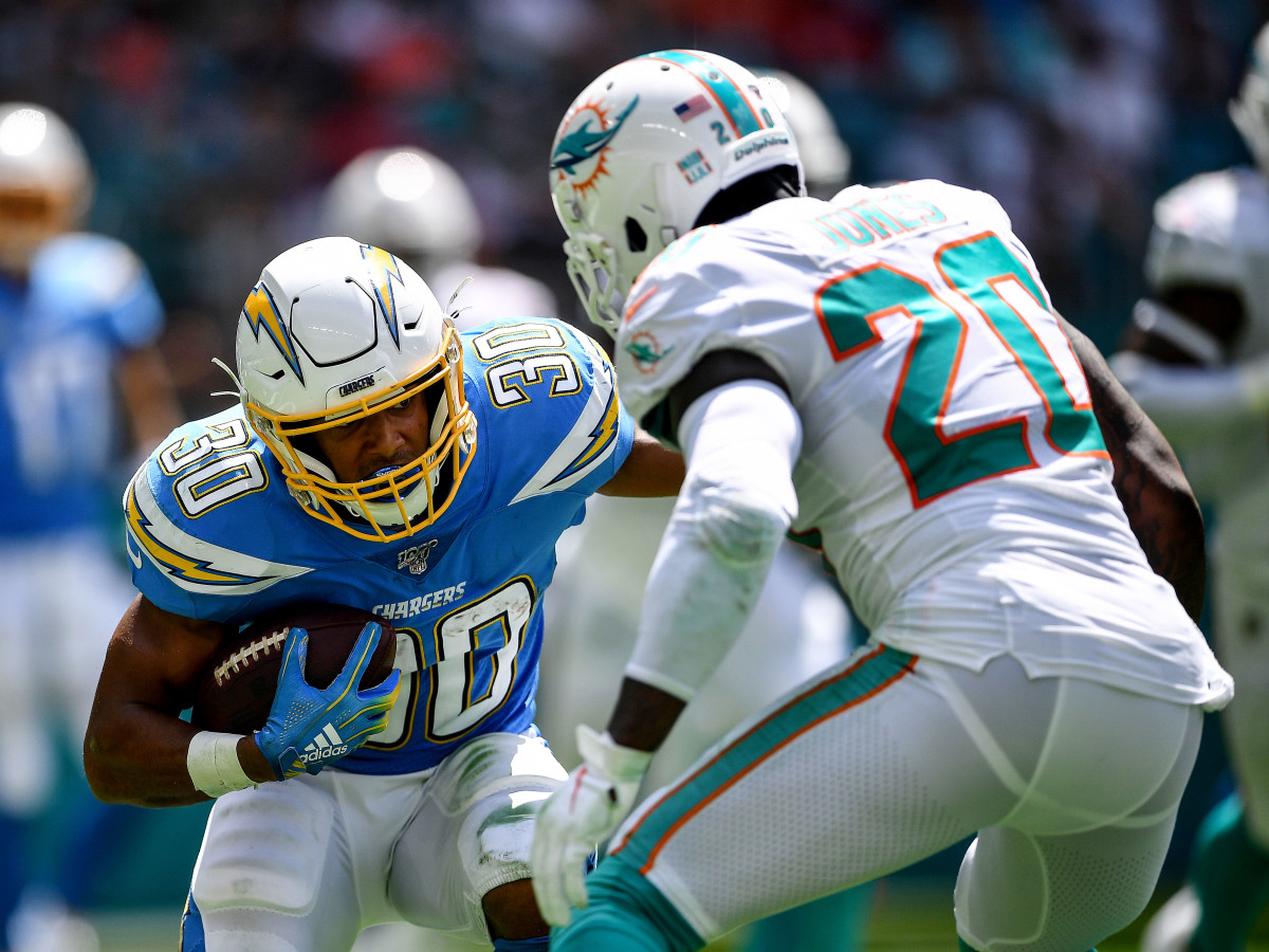MIAMI, FLORIDA - SEPTEMBER 29: Austin Ekeler #30 of the Los Angeles Chargers runs with the ball in the second quarter against the Miami Dolphins at Hard Rock Stadium on September 29, 2019 in Miami, Florida. (Photo by Mark Brown/Getty Images)
