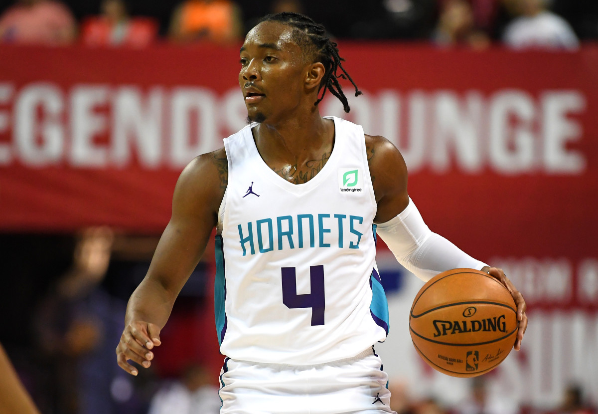 Charlotte Hornets guard Devonte' Graham (4) dribbles during the second half of an NBA Summer League game against the San Antonio Spurs at Thomas & Mack Center. (Stephen R. Sylvanie-USA TODAY Sports)