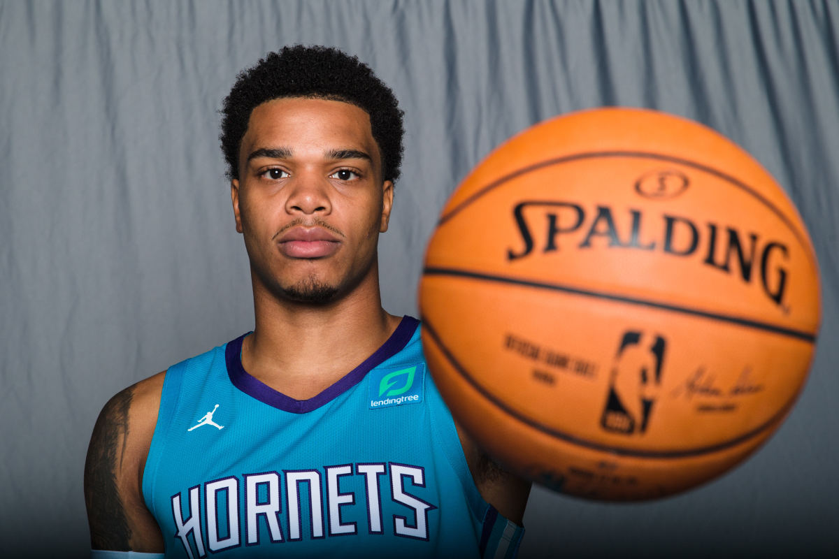 Charlotte Hornets forward Miles Bridges (0) poses for pictures during media day at Spectrum Center. (Jeremy Brevard-USA TODAY Sports)
