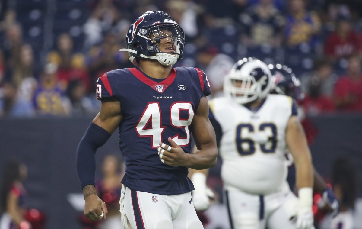 Houston Texans linebacker Jamal Davis (49) reacts after a play during the first quarter against the Los Angeles Rams at NRG Stadium.