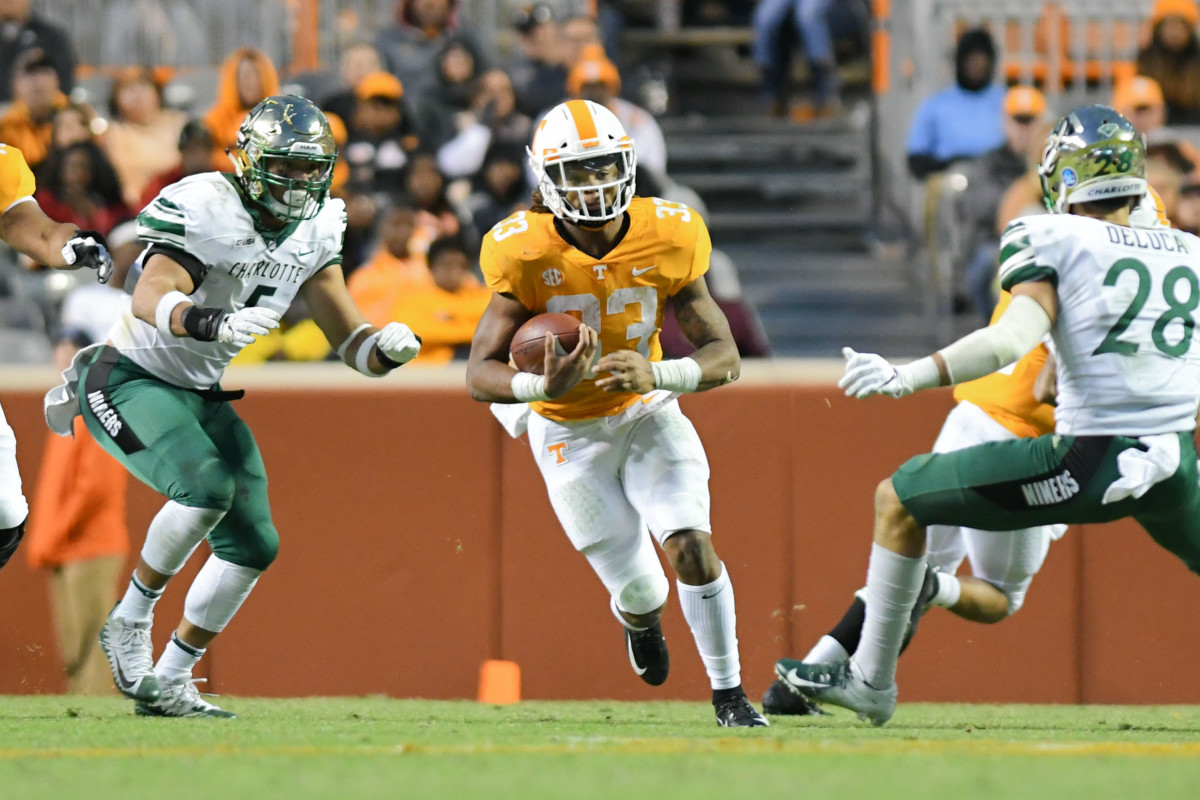 Nov 3, 2018; Knoxville, TN, USA; Tennessee Volunteers running back Jeremy Banks (33) runs with the ball against the Charlotte 49ers during the second half at Neyland Stadium. Tennessee won 14 to 3. Mandatory Credit: Randy Sartin-USA TODAY Sports