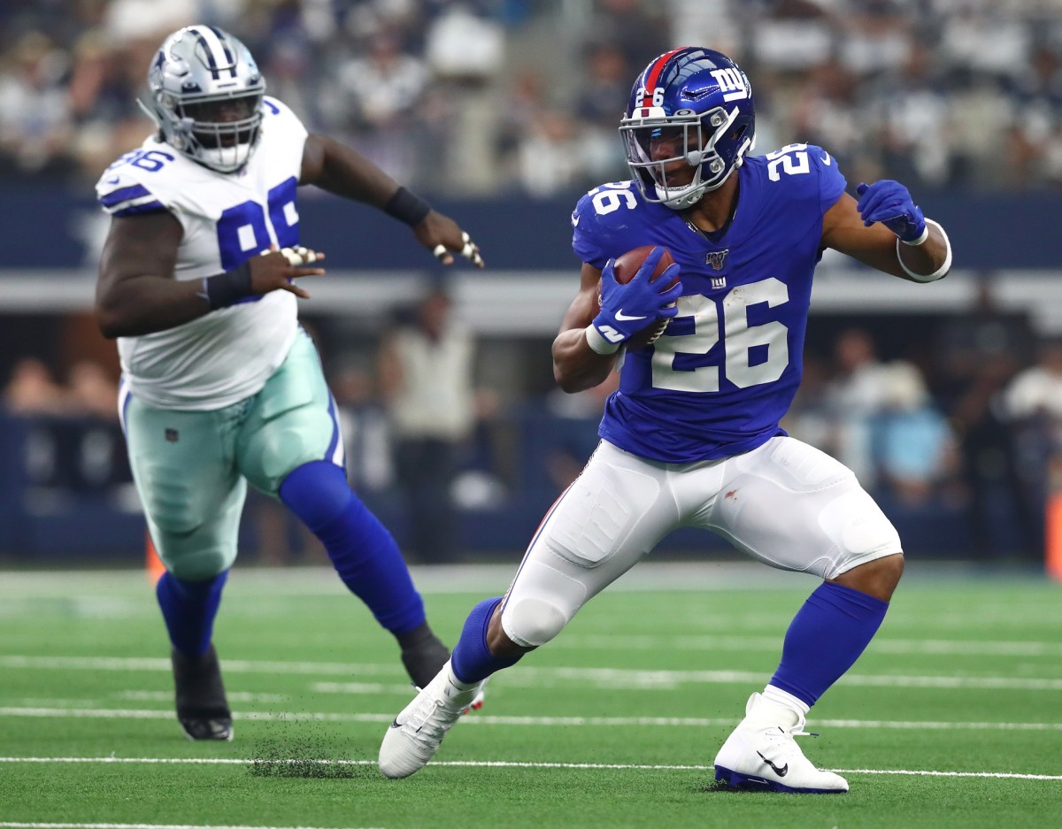 Sep 8, 2019; Arlington, TX, USA; New York Giants running back Saquon Barkley (26) runs with the ball against the Dallas Cowboys at AT&T Stadium.