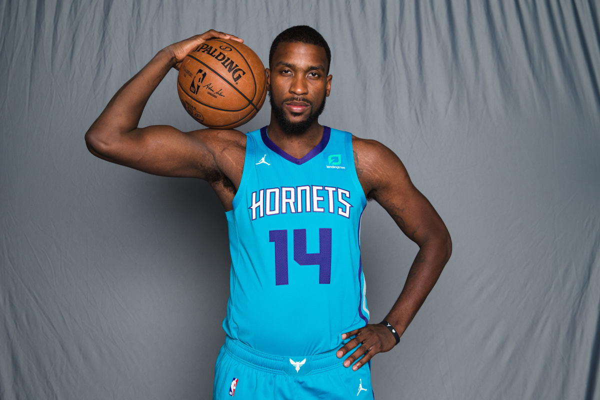 Charlotte Hornets forward Marcus Kidd-Gilchrist (14) poses for pictures during media day at Spectrum Center. (Jeremy Brevard-USA TODAY Sports)