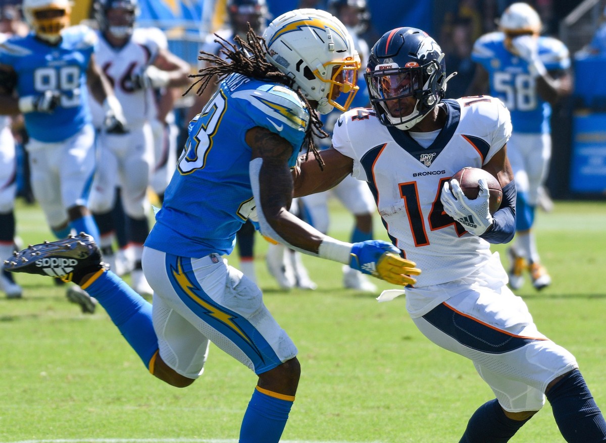 Denver Broncos wide receiver Courtland Sutton (14) tries to run past Los Angeles Chargers defensive back Rayshawn Jenkins (23) during the 1st quarter at Dignity Health Sports Park.