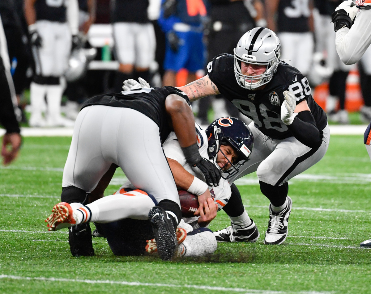 Bears quarterback Chase Daniel is sacked against Oakland, one of four the Raiders had.