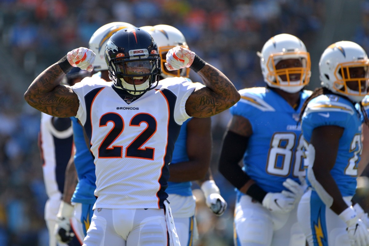 Denver Broncos defensive back Kareem Jackson (22) gestures after a defensive play during the first quarter against the Los Angeles Chargers at Dignity Health Sports Park.